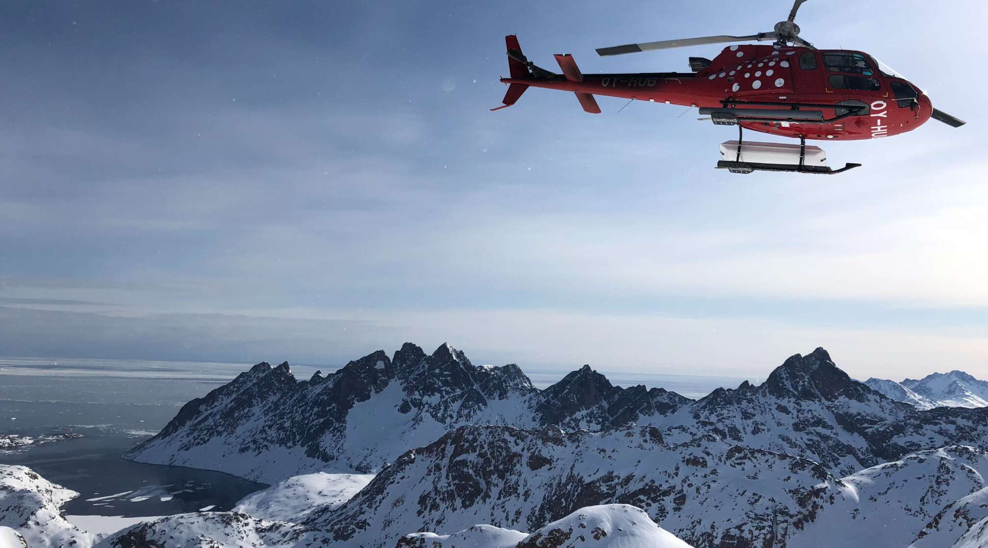 Helipad by the mountains in Greenland