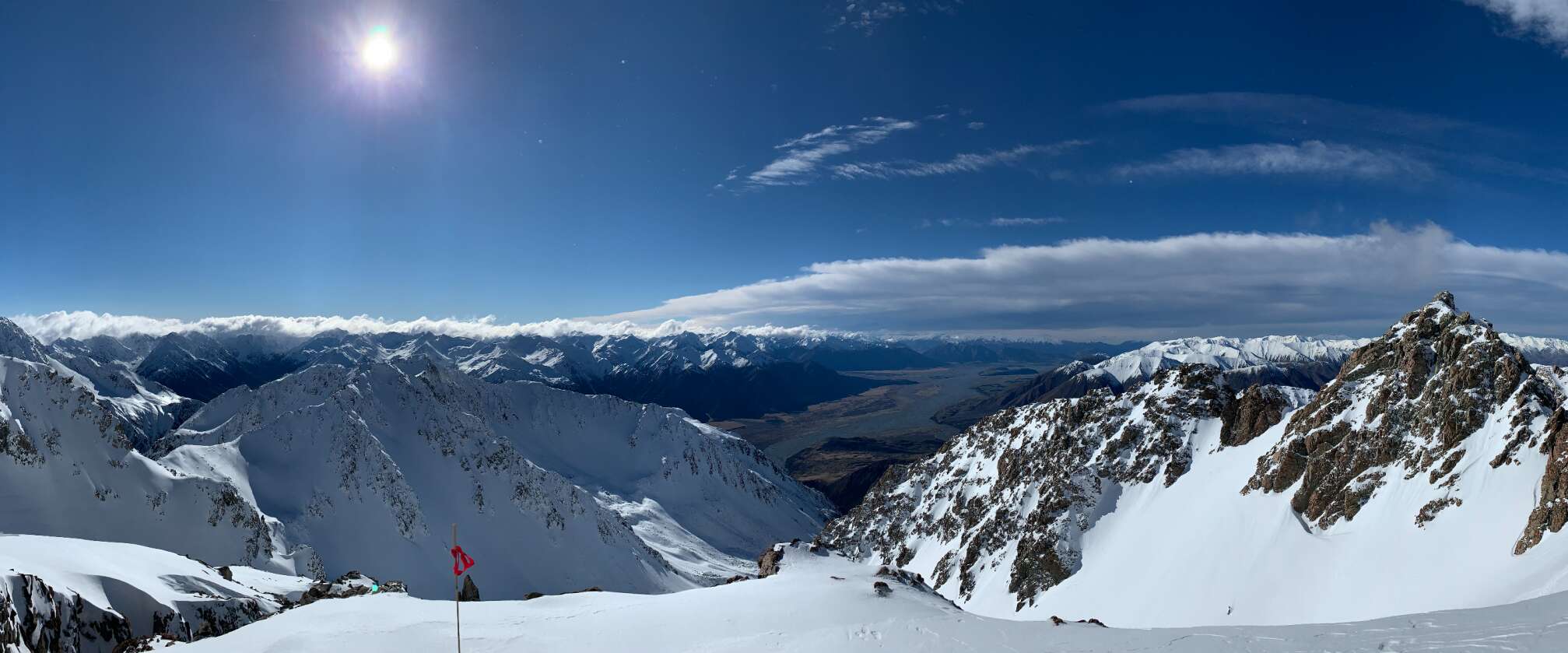Skiing in the blue sky in New Zealand