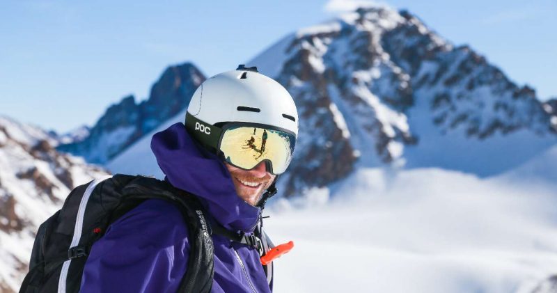 Happy man enjoying heliskiing